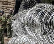 Police put up heavy protection around government buildings. -  Luis TATO / AFP