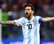 Messi feeling the heat.