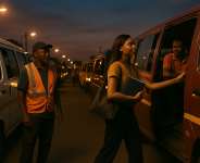 Tro-tros line up. Drivers rotate shifts. A young woman boards, clutching a textbook and hope