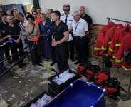 A firefighter speaks to the press while demonstrating an emergency cooling bath in Paris on June 28, 2026. -  Kenzo Tribouillard, AFP