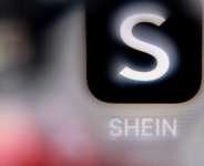 Lawmakers hope to rein in Asian e-commerce companies like Shein that have exploded in popularity in France -  Kirill KUDRYAVTSEV / AFP
