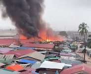 Fire guts rubber factory at Circle Odawna as flooding hampers firefighting efforts