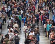 Migrants queue at a public service office to obtain paperwork needed to apply for Spains immigration amnesty near Barcelona on April 21, 2026. -  Emilio Morenatti, AP