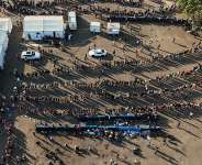 A drone view of thousands of Malawians at a Durban drive-in site amid fears of anti-immigrant violence ahead of a June 30 deadline set by activists demanding undocumented migrants leave the country, in Durban, South Africa, 25 June 2026. - REUTERS - Siyabonga Sishi