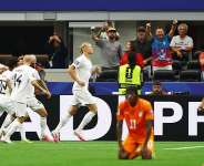 Norways Erling Haaland celebrates scoring their second goal. - Kai Pfaffenbach, Reuters