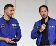 French astronaut Thomas Pesquet (R) next to French astronaut Arnaud Prost, at the presidential Elysee Palace in Paris on 5 February, 2026. - AFP/Ludovic Marin