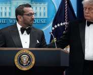 President Donald Trump listens as FBI director Kash Patel speaks in the James Brady Press Briefing Room at the White House after an unspecified threat at the annual White House Correspondents Association Dinner in Washington on April 25, 2026. - Jose Luis Magana, AP