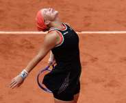 Russias Diana Shnaider celebrates after winning her quarter final match against Belarus Aryna Sabalenka on June 3, 2026. - Stephane Mahe, Reuters