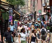 Pedestrians walk through central Ajaccio, Corsica. French lawmakers are considering a constitutional reform that would grant the Mediterranean island greater autonomy within France. - AFP - PASCAL POCHARD-CASABIANCA