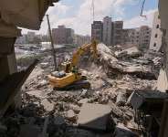 Rescue workers use an excavator as they search for victims under the rubble of a building that was hit in an Israeli air strike on Monday in the southern port city of Tyre, Lebanon, June 2, 2026. -  Mohammed Zaatari, AP