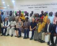 Alhaji Saibu (in smock seated in the middle) amongst participants during the event