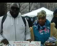 Rashad McCrorey and the mother of Eric Garner at 2014 March on Washington, DC