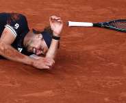 Germanys Alexander Zverev celebrates after winning the French Open mens title against Italys Flavio Cobolli in Paris on June 7, 2026. - Guglielmo Mangiapane, Reuters