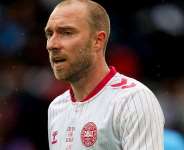 Christian Eriksen ‘conscious and doing well’ after collapsing on pitch