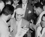 Jules Rimet(centre) hands over the trophy bearing his name to the Uruguay captain Obdulio Varela after his sides 2-1 win in the final match of the 1950 World Cup in Brazil. - AFP