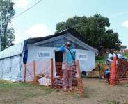 Congolese health workers stand at the Bunia Evangelical Medical Center during a visit by European Commissioner for Equality, and Preparedness and Crisis Management Hadja Lahbib, to assess the response to the Ebola outbreak, 7 June 2026. - Gradel Muyisa Mumbere/Reuters