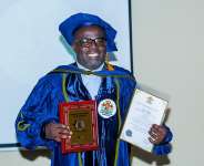Mr. Maxwell Commey, CEO of Oro Oil Ghana Limited displays his award