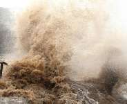 Huge waves crash on the coastline ahead of Typhoon Bavi in Wenling in eastern Chinas Zhejiang province on July 10, 2026. -  Chinatopix Via AP