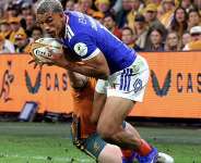 Frances Aaron Grandidier-Nkanang scores a try against Australia in Brisbane. -  Pat Hoelscher, AFP