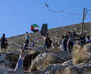 Palestinians from the Israeli-occupied West Bank village of Burin celebrate the annual kite festival, which they say offers some respite from the daily hardship. -  Jaafar Ashitiyh, AFP