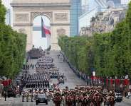 File photo: Frances President and the Chief of the Defence Staff General review troops during the annual Bastille Day military parade with on the Champs-Elysees Avenue in Paris on July 14, 2025. -  Ludovic Marin, AFP