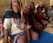 Displaced women from South Kordofan sit on the ground in El Obeid, North Kordofan State, Sudan, on 15 January, 2026. - REUTERS - El Tayeb Siddig