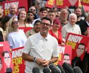Labour MPs hope the more relaxed Andy Burnham (centre) can communicate with the public better than his precedessor Keir Starmer. - AFP - OLI SCARFF