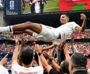 Azzedine Ounahi thrown in the air after Morocco secured quarter-final spot following Canadas defeat /  FIFA World Cup