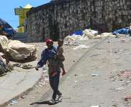 People on a road in Kenscoff, near Haitis capital Port-au-Prince, in April 2025. The town has been subjected to gang attacks since January 2025. -  AP/Odelyn Joseph
