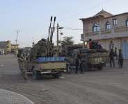 Tuareg rebels of the Azawad Liberation Front (FLA) ride on the back of pickup trucks in Kidal, on April 26, 2026. - AFP