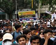 Activists and supporters of the Cockroach Janta Party  protest to demand the resignation of Indias Education Minister, Dharmendra Pradhan. -  Manan Vatsyayana, AFP