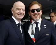 Gianni Infantino (left) and Alejandro Dominguez (right) have both spoken about expanding the World Cup to 64 teams Credit: Getty Images/Eva Marie Uzcategui