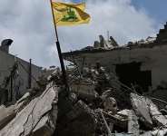 A yellow flag belonging to the Iran-backed Shia Muslim party Hezbollah flutters in Tyre, June 23, 2026 -  Joseph Eid, AFP