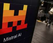 This file photo shows an ad for French AI firm Mistral in a New York City subway station. -  Shannon Stapleton, Reuters
