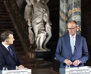 German Chancellor Friedrich Merz and French President Emmanuel Macron hold a press conference following a meeting of the Franco-German Ministerial Council in Brhl,  Germany, Friday, July 17, 2026. (Oliver Berg/dpa via AP) - Oliver Berg/DPA via AP - Oliver Berg