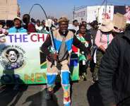 Anti-immigrant protesters march in Johannesburg, South Africa, on 9 July 2026. The country has seen a tide of demonstrations and violence against foreign residents. -  REUTERS - Oupa Nkosi