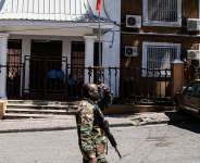 A soldier patrols in front of the Provisional Electoral Council (CEP) as the government announces the registration period for political parties ahead of the upcoming general election, in Port-au-Prince, Haiti, on March 3, 2026. -  Clarens Siffron, AFP