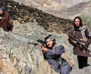 Afghan Taliban soldiers look toward the Pakistani border, 27 February 2026. -  Wahidullah Kakar, AP