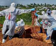 Red Cross workers lower the coffin of Dr. Tibenderana Katho Blaise who worked at the Centre Medical Evangelique (CME) in Hoho commune and died of Ebola virus, in Bunia town, Ituri province, Democratic Republic of Congo, 26 May 2026. -  Gradel Muyisa Mumbere, Reuters