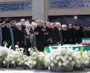 Iranian President Masoud Pezeshkian and Irans Parliament speaker Mohammad Baqer Qalibaf with officials attend a prayer during a public farewell ceremony to pay their respects to late Supreme Leader Ayatollah Ali Khamenei at the Imam Khomeini Grand Mosalla, in Tehran, Iran July 5, 2026. -  Reuters