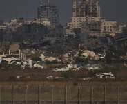 Buildings that were destroyed during the Israeli ground and air operations stand in the northern Gaza Strip as seen from southern Israel on July 2, 2026. -  Leo Correa, AP