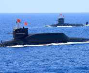 File photo - A Chinese nuclear-powered ballistic missile submarine during a military display in the South China Sea on April 12, 2018. -  China Stringer Network, via Reuters