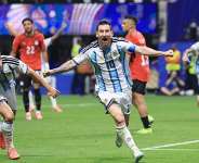 Lionel Messi celebrates after scoring Argentinas equaliser. - Elsa, Getty Images via AFP