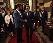 French President Emmanuel Macron (right) and Syrian President Ahmad al-Chareh arrive for dinner at a restaurant in Damascus’s Old City on July 6, 2026. -  Ludovic Marin, AFP