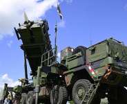 Visitors queue to take a closer look at a Patriot missile launcher during the Armed Forces Day at the Airbase in Laage, Germany, on June 06, 2026. -  John MacDougall, AFP