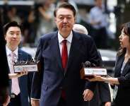 Former South Korean President Yoon Suk Yeol arrives at a court  hearing to review his arrest warrant requested by special prosecutors in Seoul, South Korea, July 9, 2025. -  Kim Hong-Ji, Reuters