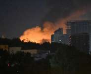 A plume of smoke rises over Kyiv on August 1, 2026, following a Russian ballistic missile attack. -  Sergei Supinsky, AFP