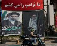 Banners reading in English and Farsi We will kill Trump” and portraits of the late Iranian Supreme Leader Ayatollah Ali Khamenei, right, and his son and successor Ayatollah Mojtaba Khamenei, in Tehran, 10 August 2026. - AP Photo/Vahid Salemi - Vahid Salemi