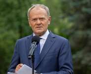 Polish Prime Minister Donald Tusk addresses the press during a press conference held in the gardens of the Prime Ministers Office in Warsaw on July 3, 2026. -  Wojtek Radwanski, AFP