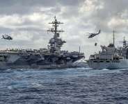 This handout picture released by the US Navy on May 8, 2019 shows the Nimitz-class aircraft carrier USS Abraham Lincoln (CVN 72) while conducting a replenishment-at-sea. -  Jason Waite, US Navy via AFP file photo